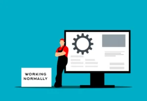 Illustration of a person with crossed arms standing next to a large monitor displaying a gear icon and text, with a sign in front that reads 'WORKING NORMALLY' on a blue background.