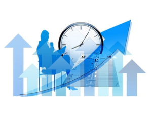 Graphic illustration of a person working at a desk with a graph arrow trending upwards, overlayed with a clock, symbolizing productivity and time management in business.