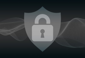 Graphic of a silver shield with a padlock icon, symbolizing cybersecurity, on a dark background with abstract wave patterns.