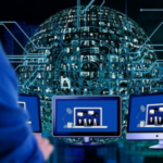 Alt text: Person viewing multiple computer screens showing analytical data with a futuristic digital globe structure in the background set against a dark, circuit-like backdrop.